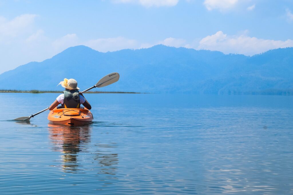 woman kayaking alone