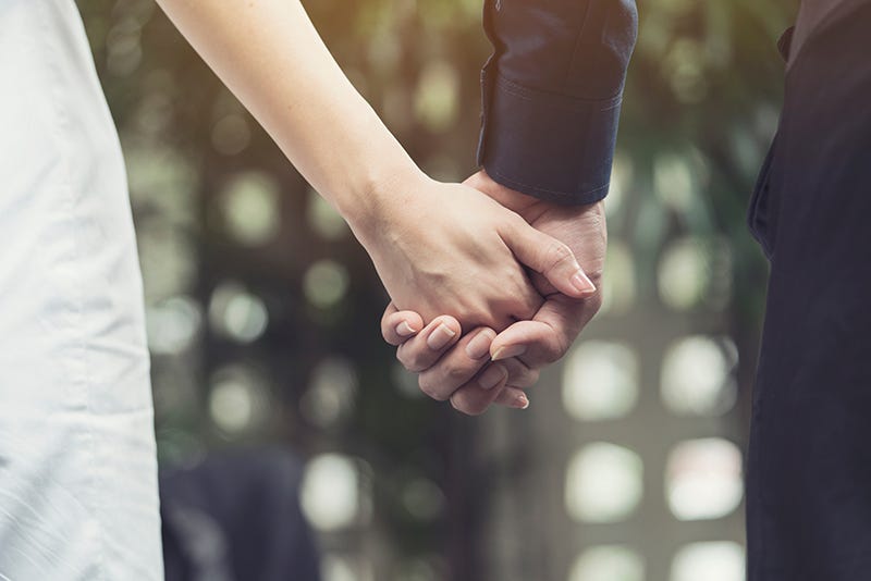 building trust - couple holding hands